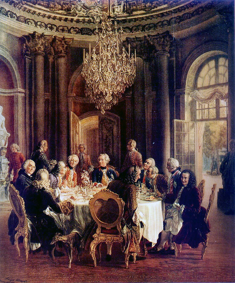 Voltaire junto a Federico II de Prusia y sus colaboradores, en el Palacio de Sanssouci. Óleo pintado por Adolph von Menzel en 1850. El palacio de Sanssouci era la residencia de verano del rey. Allí tenían lugar veladas musicales y representaciones teatrales y acudían visitantes ilustres de las artes y las ciencias.